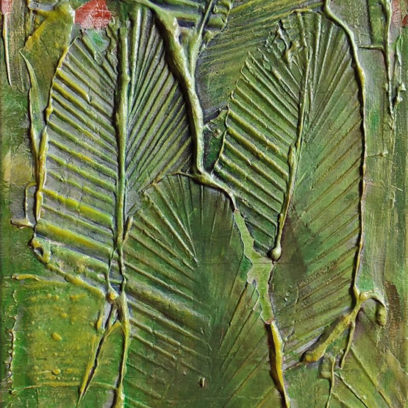 Een schilderij van grote groene bladeren.